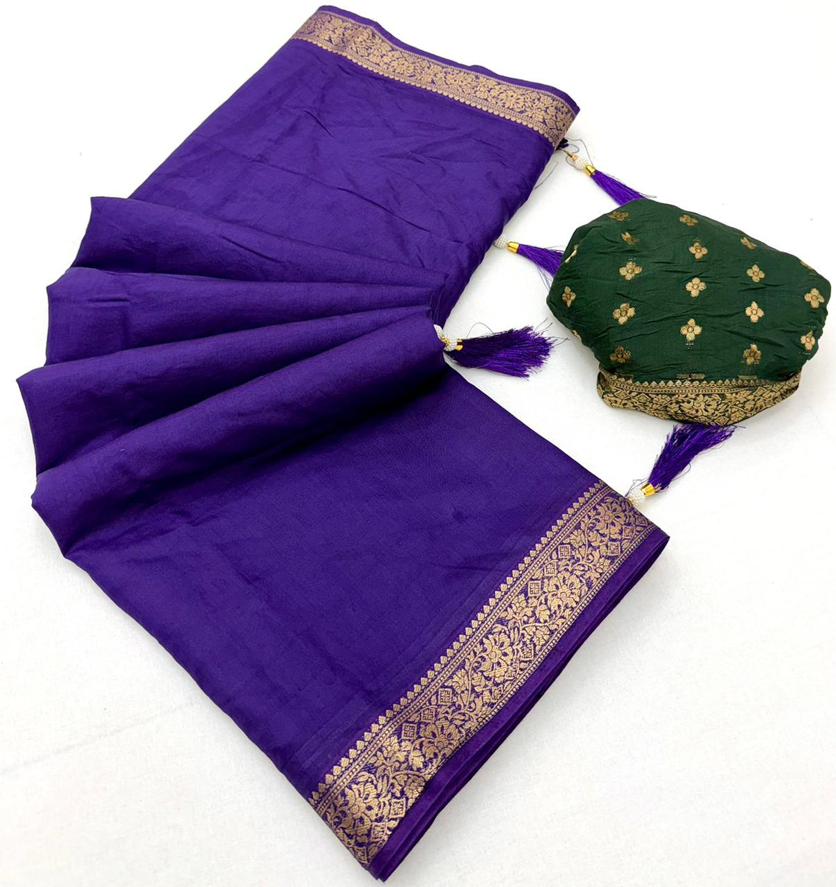 Premium Cotton Viscose with Weaving Border and Contrast Blouse and Fancy Tassels.